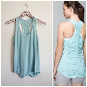 LULULEMON Runner Up Tank Top Size 8 Aquamarine Color Stripe Ruched Back Blue